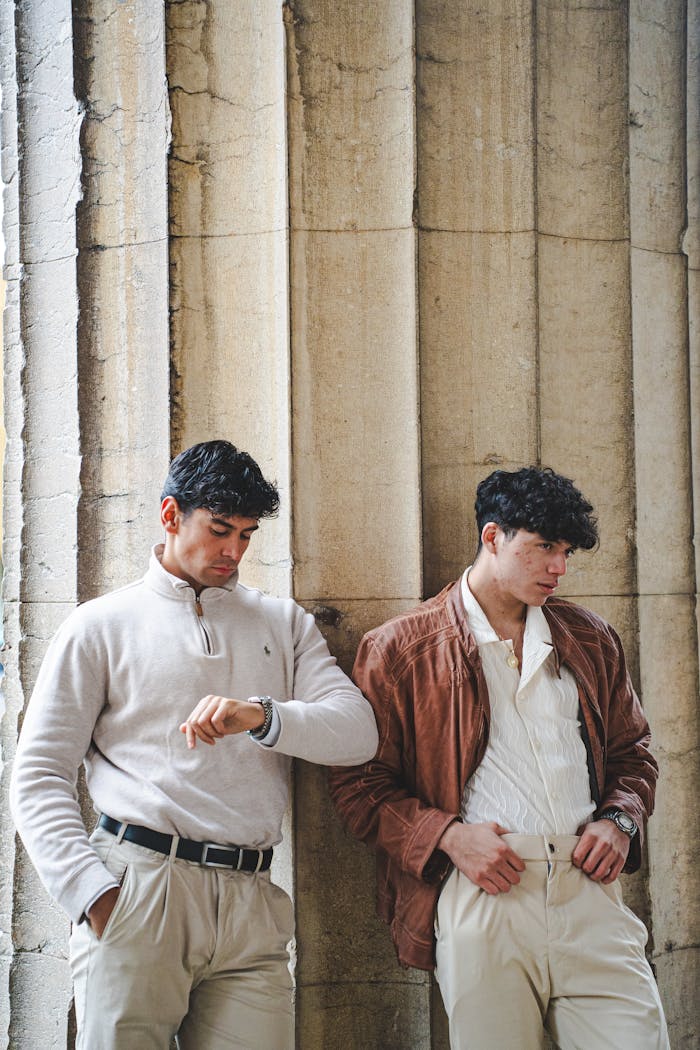 gallery-5 Two fashionable men in Munich showcasing classic autumn urban style.